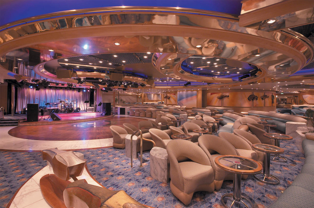 Круизный лайнер Enchantment of the Seas - Гостиная Carousel (Carousel Lounge)